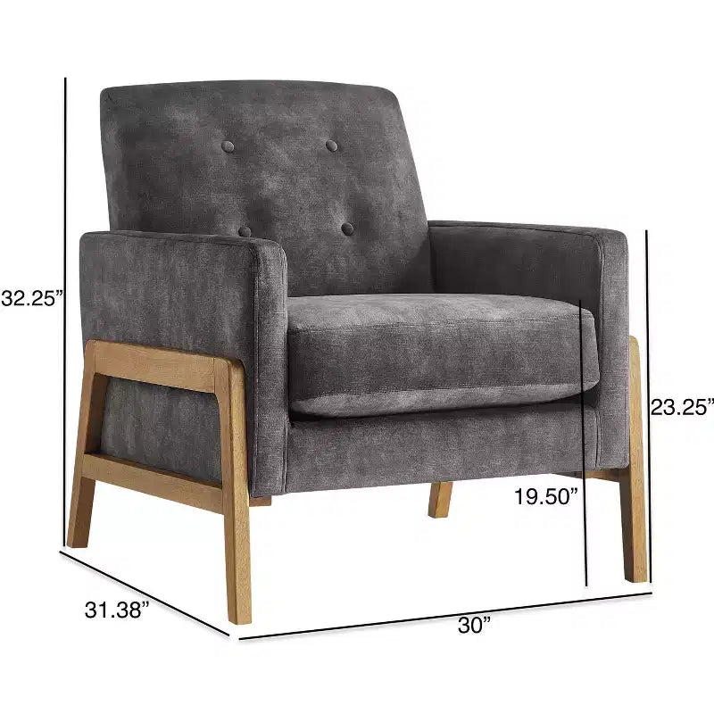 Poltrona moderna ed elegante con schienale trapuntato, rivestita in tessuto e con struttura in legno massello, ideale per il relax e la lettura in salotto