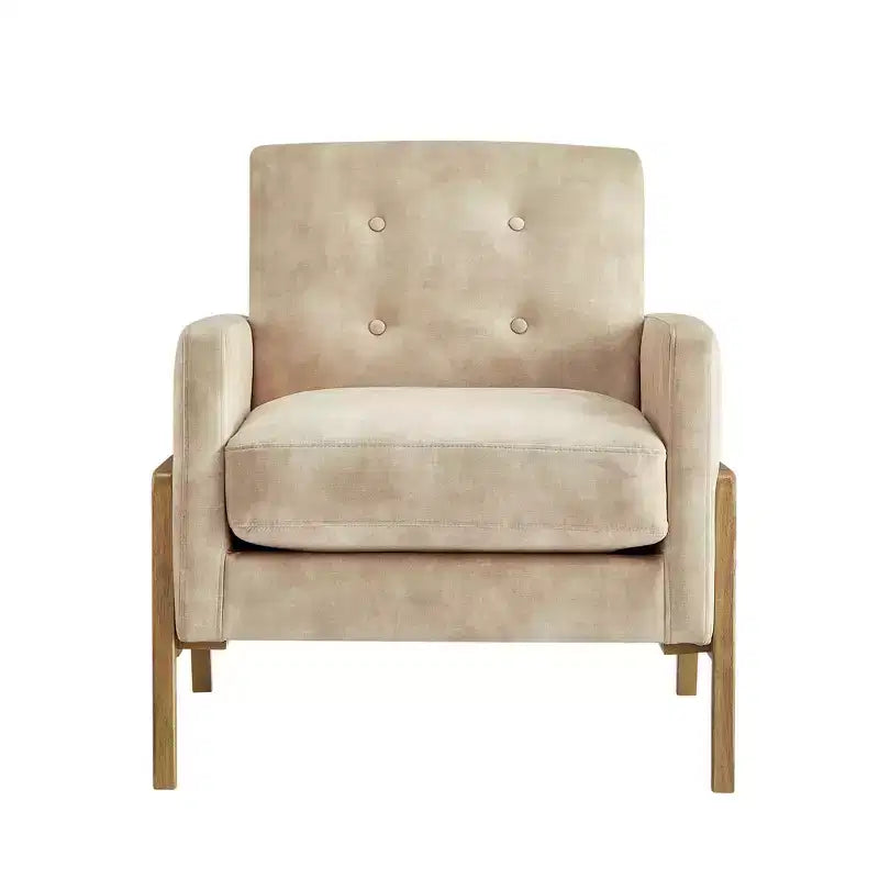 Poltrona moderna ed elegante con schienale trapuntato, rivestita in tessuto e con struttura in legno massello, ideale per il relax e la lettura in salotto