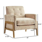Poltrona moderna ed elegante con schienale trapuntato, rivestita in tessuto e con struttura in legno massello, ideale per il relax e la lettura in salotto